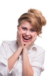 portrait of surprised girl with nice hairstyle